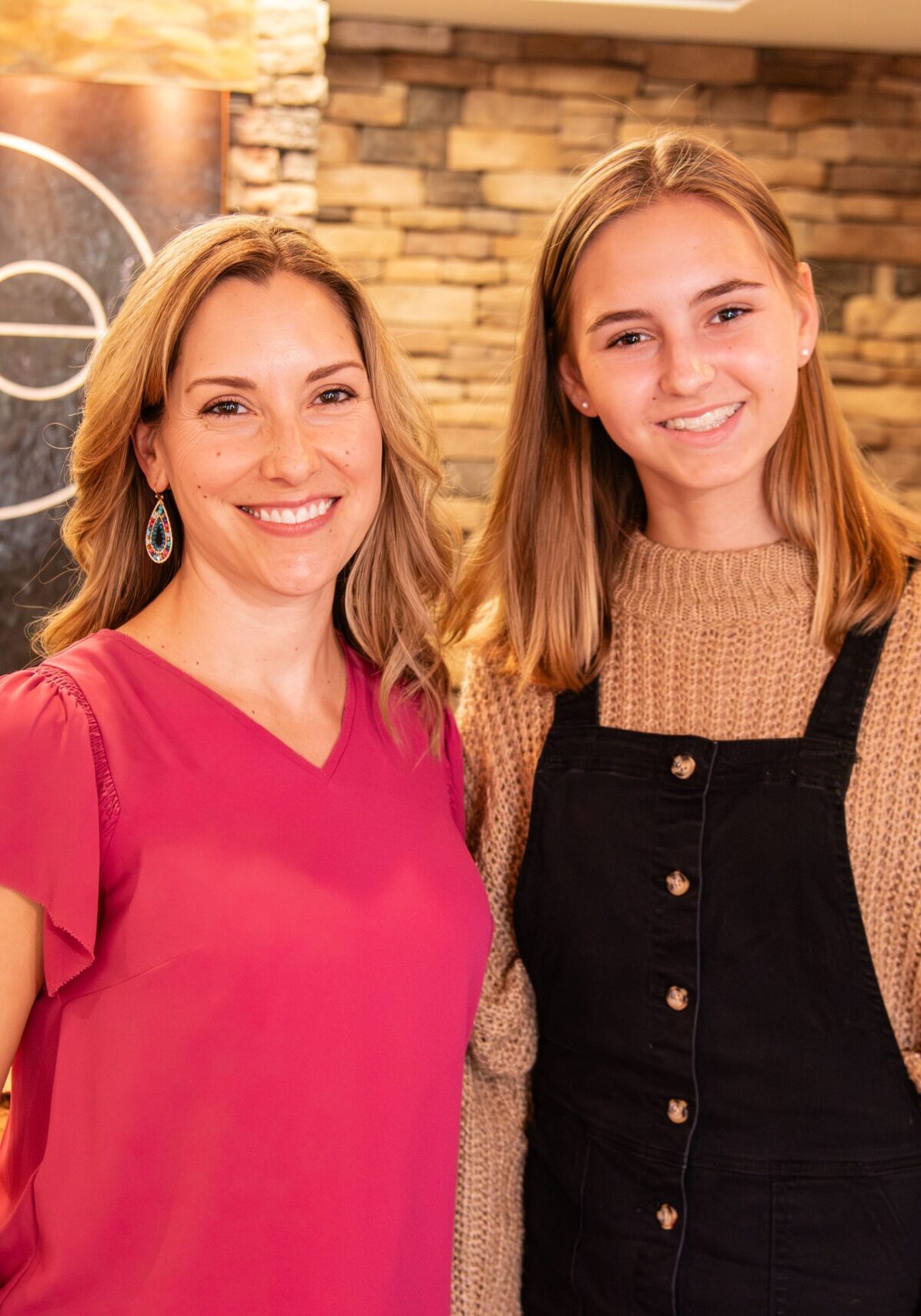 Teen and adult female patients smiling