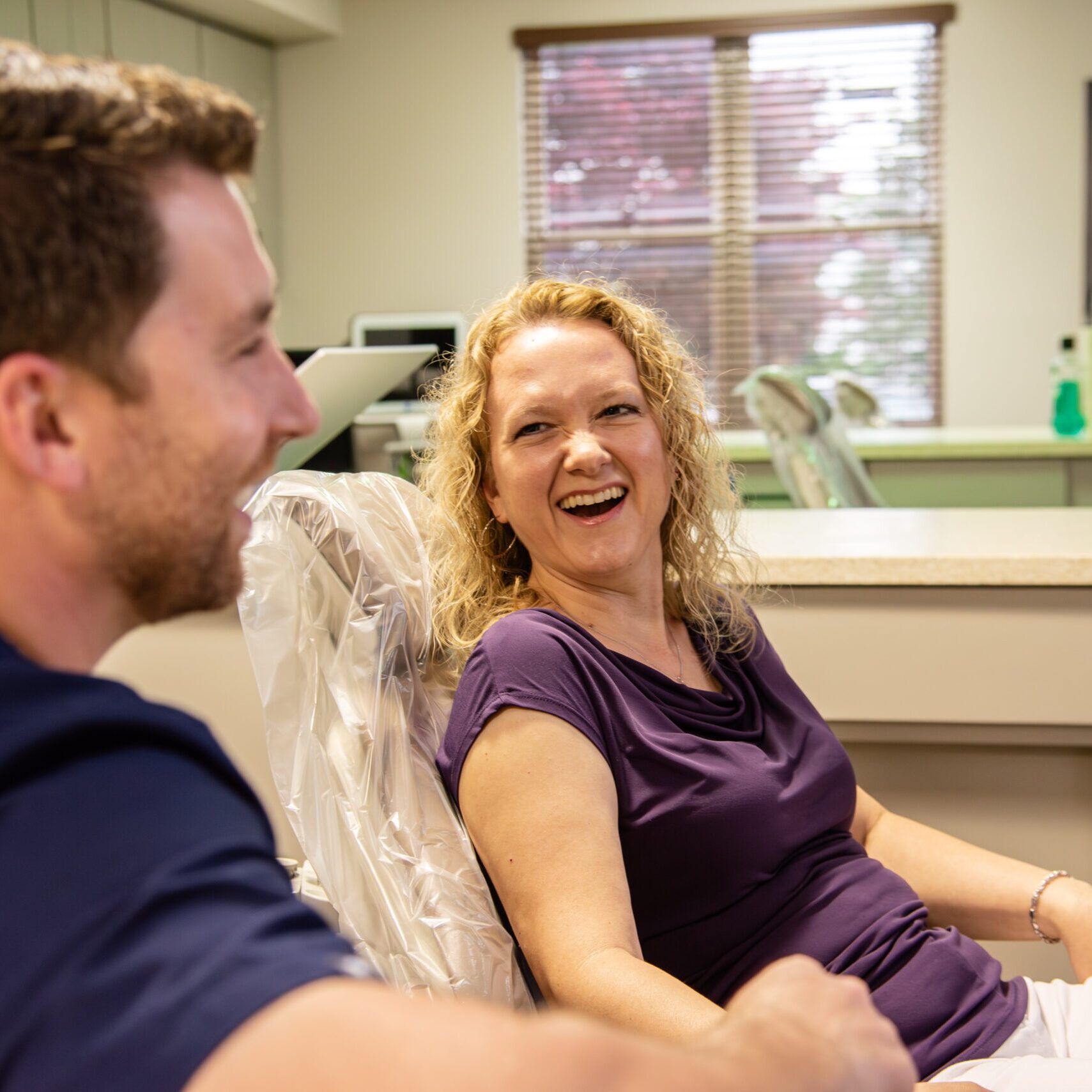 alba-ortho-patient-interaction-246 Doctor laughing with female patient