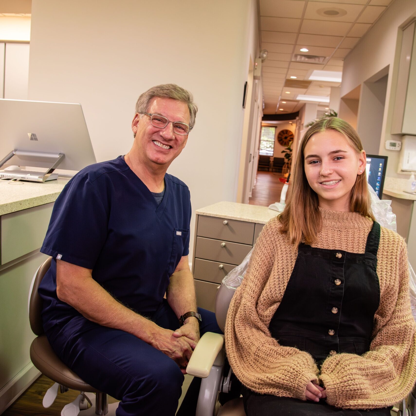 Doctor with smiling female patient